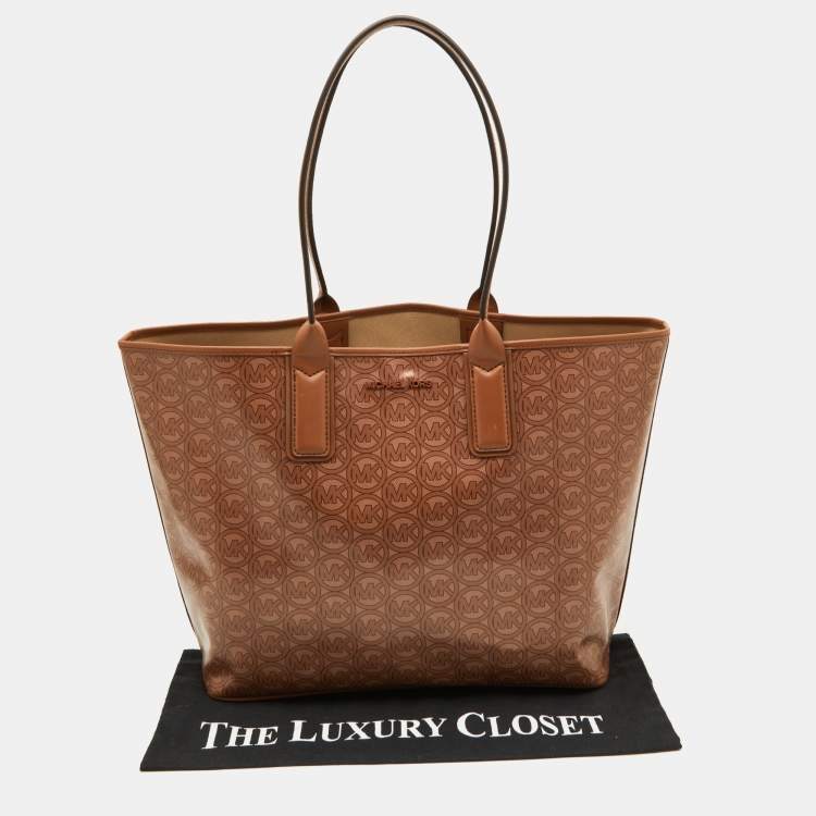 Pre Owned Michael Kors Brown Coated Canvas and Leather Jodie Shopper Tote