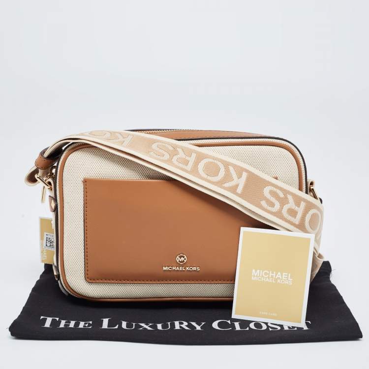 Pre Owned Michael Kors Beige/Tan Canvas And Leather Maeve Crossbody Bag