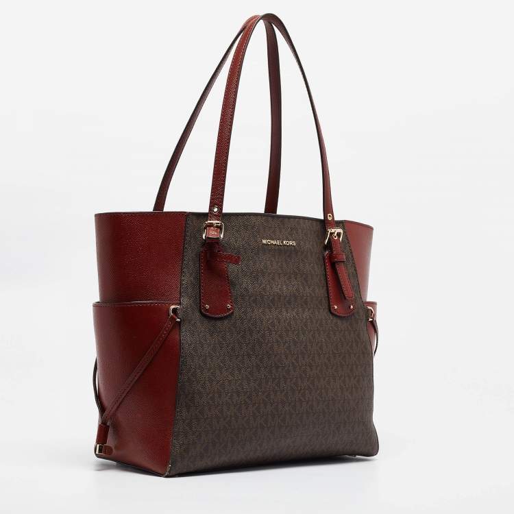 Pre Owned Michael Kors Red/Brown Signature Coated Canvas and Leather Voyager East West Tote