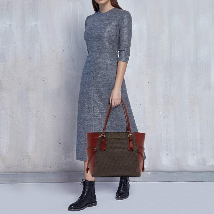 Pre Owned Michael Kors Red/Brown Signature Coated Canvas and Leather Voyager East West Tote