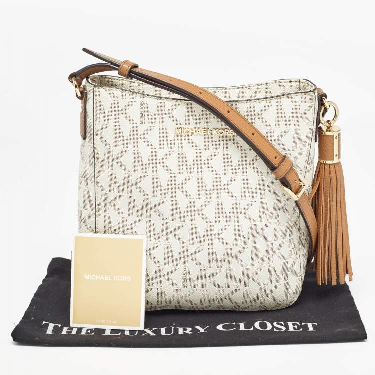 Pre Owned Michael Kors White Signature Coated Canvas and Leather Tassel Messenger Bag