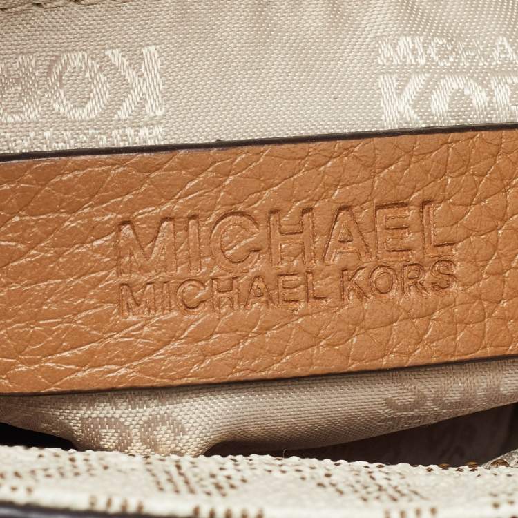 Pre Owned Michael Kors White Signature Coated Canvas and Leather Tassel Messenger Bag