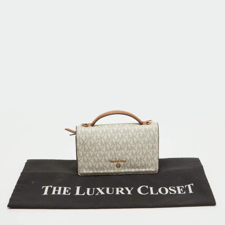 Pre Owned Michael Kors Brown /White Signature Coated Canvas and Leather Phone Wallet Bag