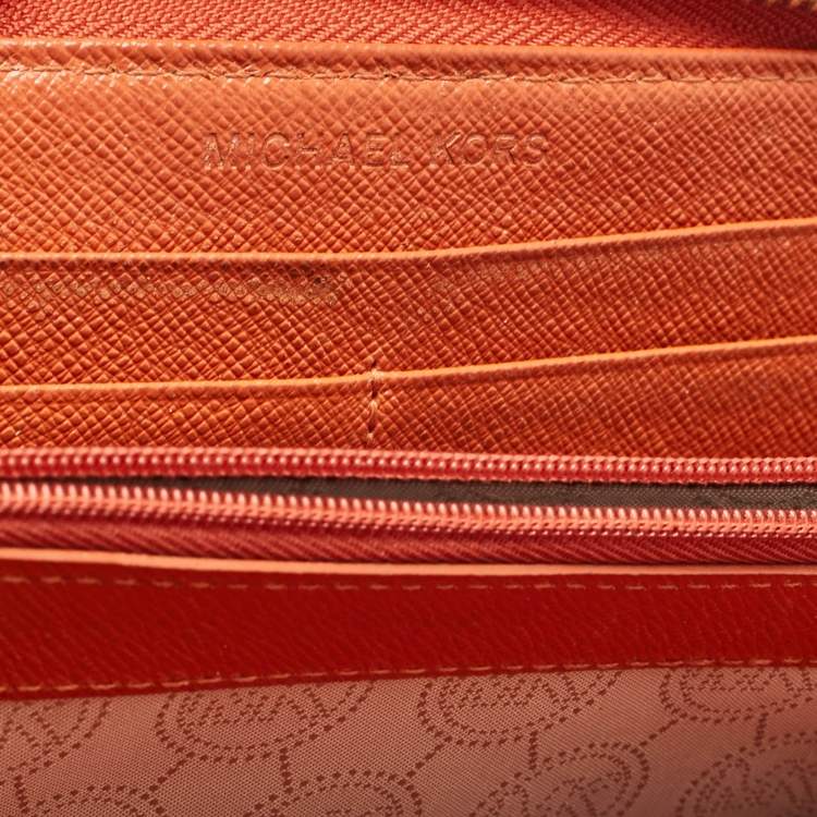 Pre Owned Michael Kors Orange/Brown Snakeskin Embossed Leather Jet Set Zip Around Wallet