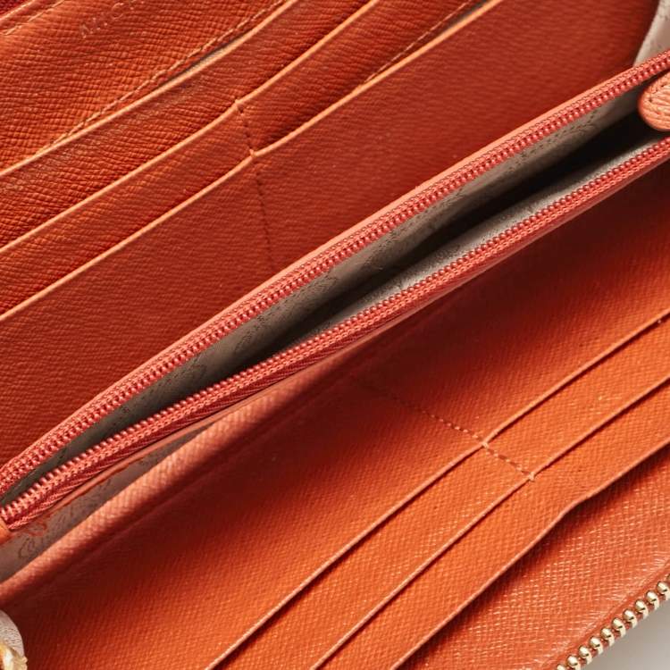 Pre Owned Michael Kors Orange/Brown Snakeskin Embossed Leather Jet Set Zip Around Wallet