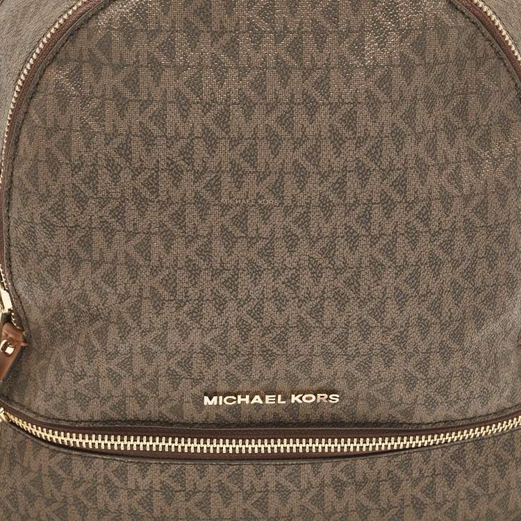 Pre Owned Michael Kors Brown Signature Coated Canvas and Leather Medium Rhea Backpack
