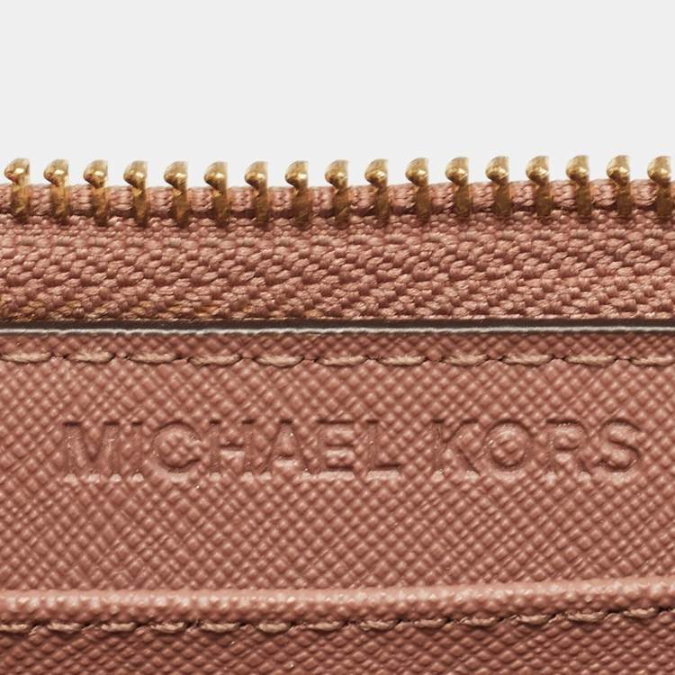 Pre Owned Michael Kors Dusty Pink Leather Jet Set Three Quarter Zip Around Wallet