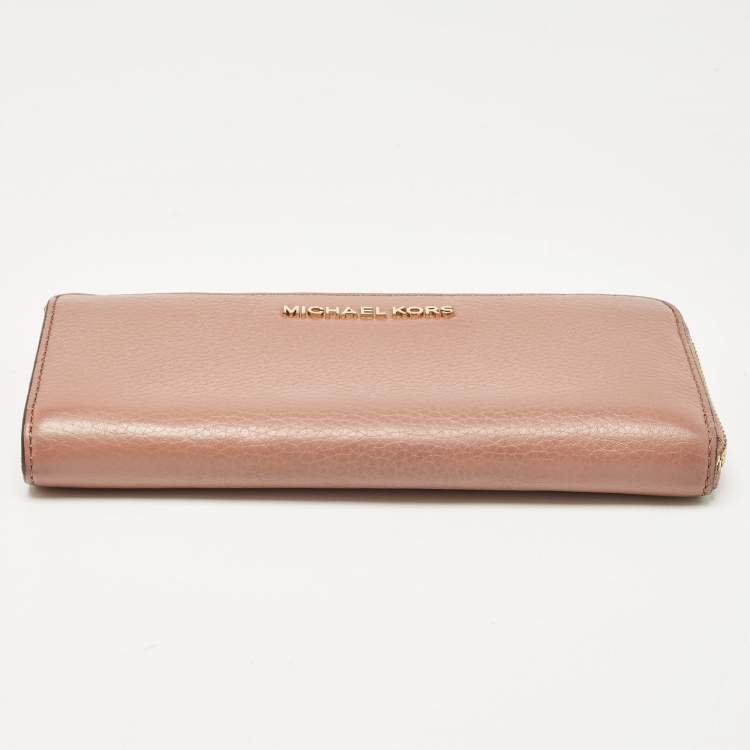 Pre Owned Michael Kors Dusty Pink Leather Jet Set Three Quarter Zip Around Wallet