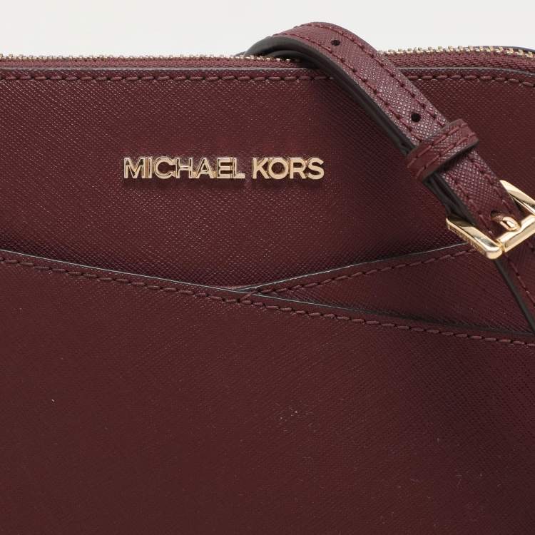 Pre Owned Michael Kors Burgundy Leather Medium Jet Set Travel Dome Crossbody Bag