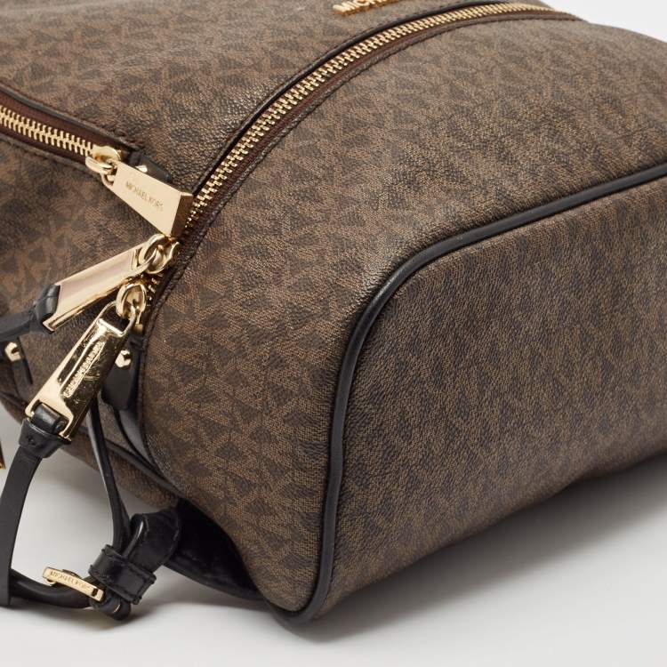 Pre Owned Michael Kors Brown Signature Coated Canvas and Leather Medium Rhea Backpack