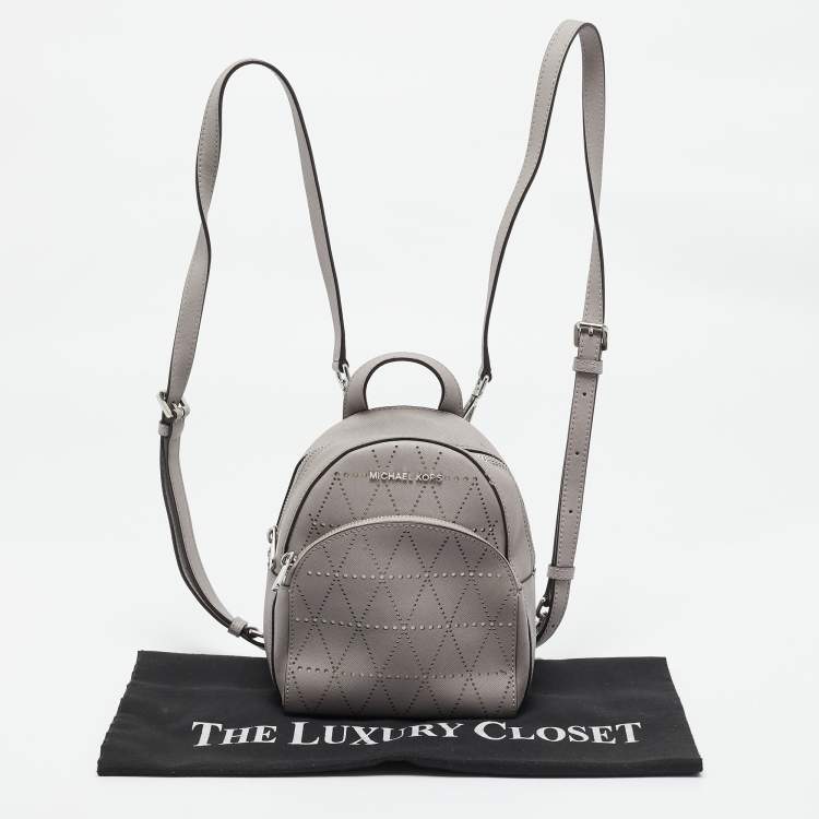 Pre Owned Michael Kors Grey Perforated Quilted Leather Mini Rhea Backpack