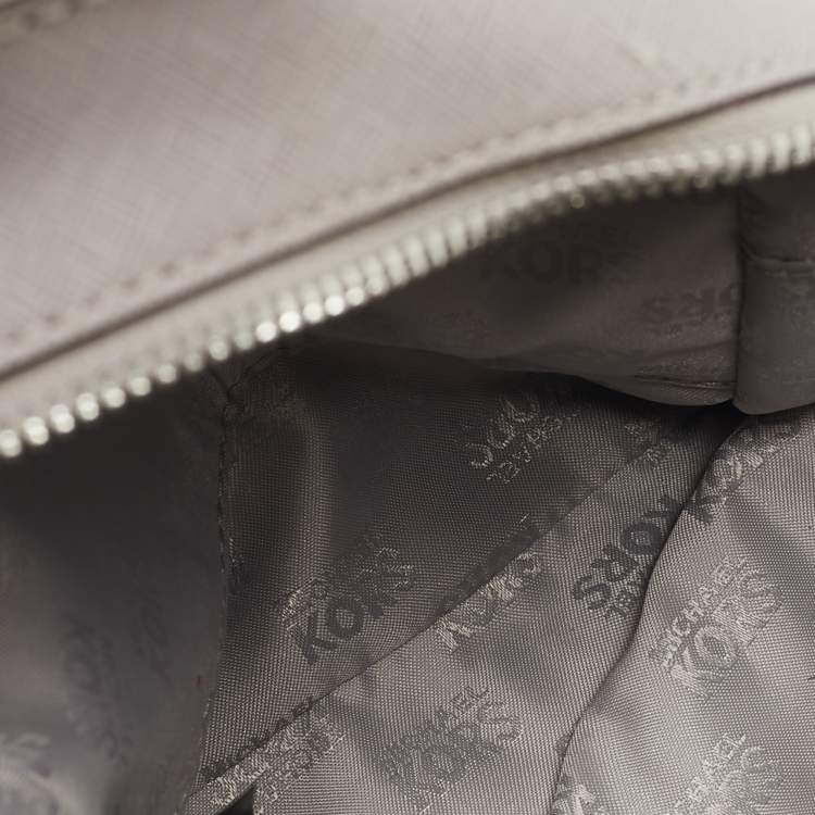 Pre Owned Michael Kors Grey Perforated Quilted Leather Mini Rhea Backpack