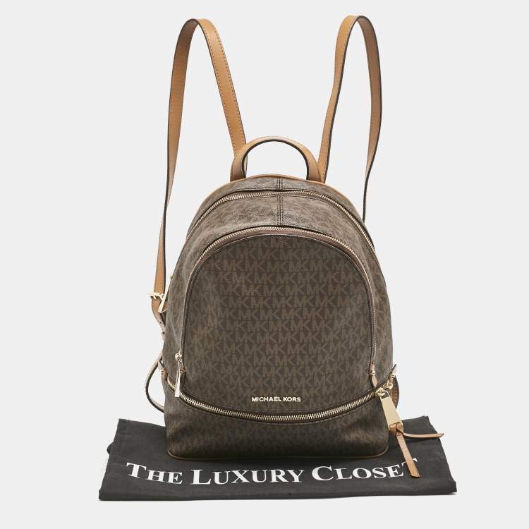 Pre Owned Michael Kors Brown Signature Coated Canvas and Leather Medium Rhea Backpack