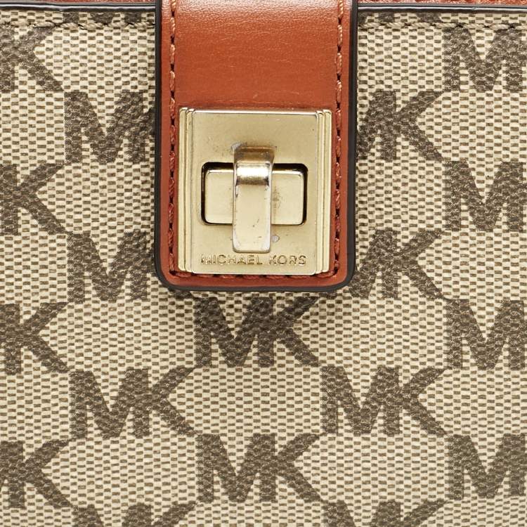 Pre Owned Michael Kors Beige/Orange Signature Coated Canvas Natalie Heritage Compact Wallet