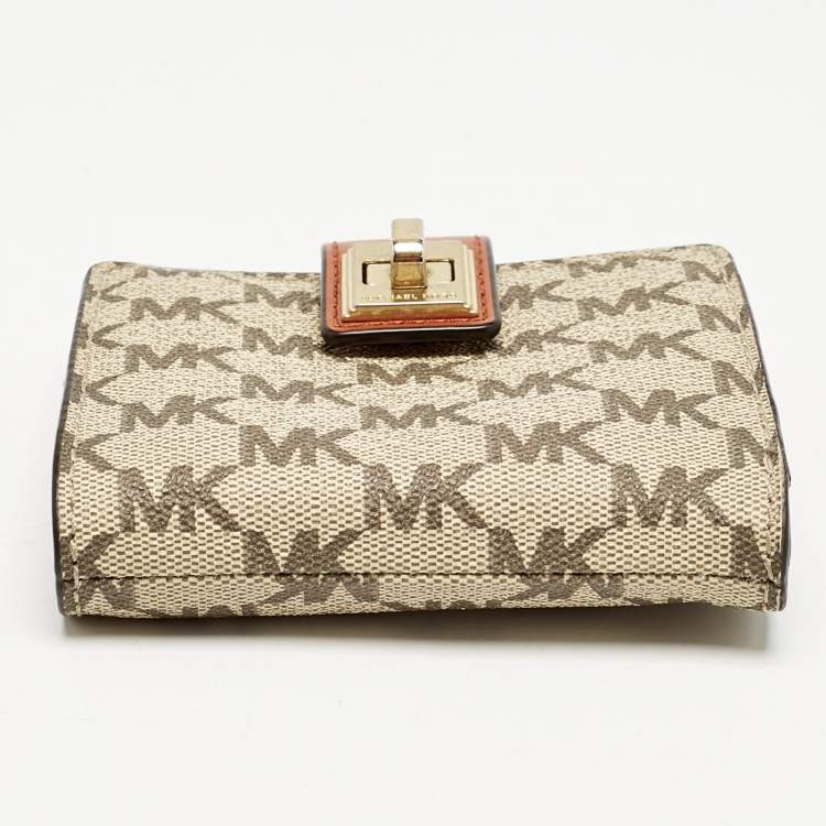 Pre Owned Michael Kors Beige/Orange Signature Coated Canvas Natalie Heritage Compact Wallet