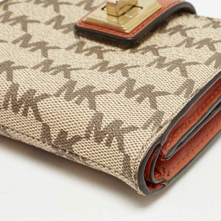 Pre Owned Michael Kors Beige/Orange Signature Coated Canvas Natalie Heritage Compact Wallet