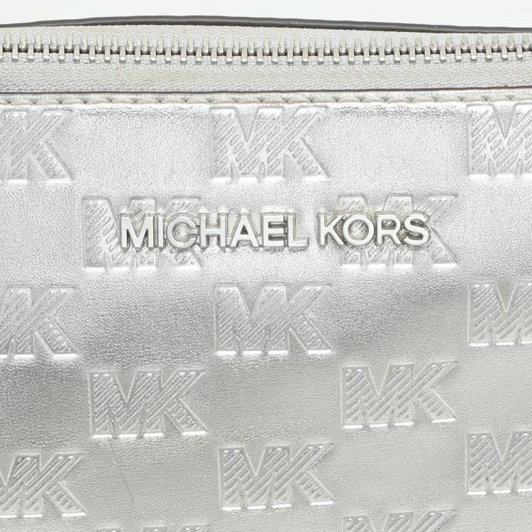 Pre Owned Michael Kors Silver Logo Embossed Leather Jet Set Medium Crossbody Bag
