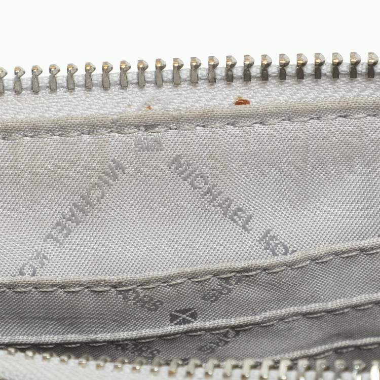 Pre Owned Michael Kors Silver Logo Embossed Leather Jet Set Medium Crossbody Bag