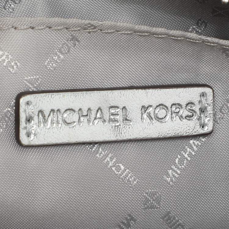 Pre Owned Michael Kors Silver Logo Embossed Leather Jet Set Medium Crossbody Bag