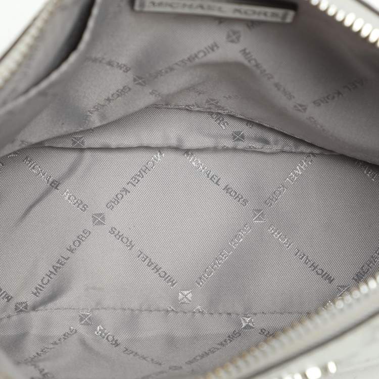 Pre Owned Michael Kors Silver Logo Embossed Leather Jet Set Medium Crossbody Bag