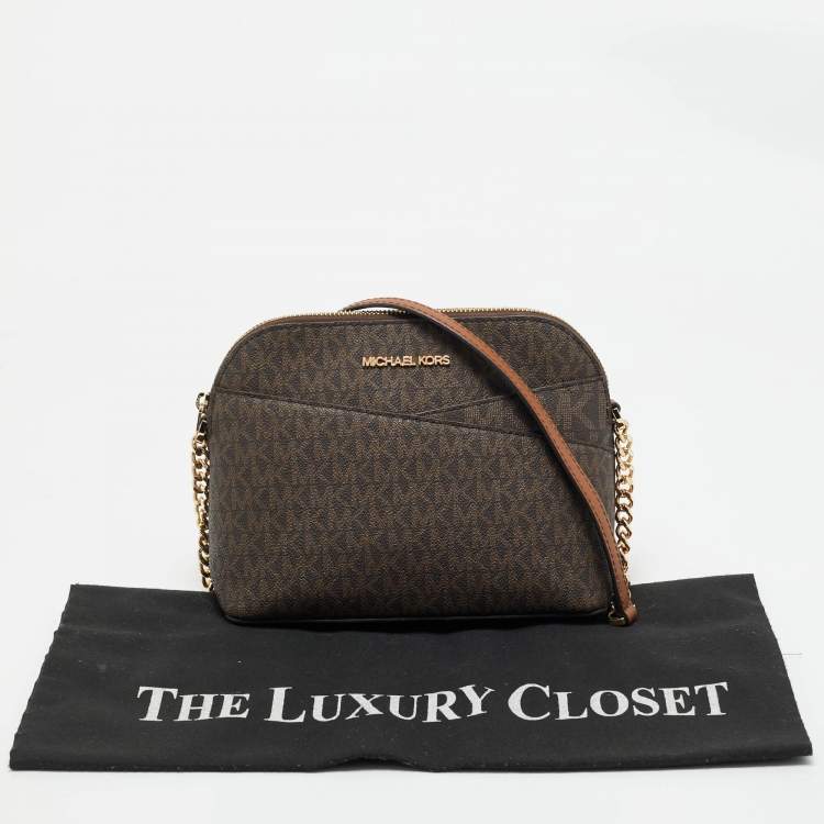 Pre Owned Michael Kors Brown Signature Coated Canvas and Leather Jet Set Travel Crossbody Bag