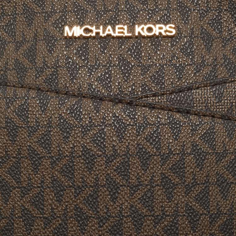 Pre Owned Michael Kors Brown Signature Coated Canvas and Leather Jet Set Travel Crossbody Bag