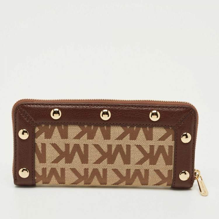 Pre Owned Michael Kors Beige/Dark Brown Signature Canvas and Leather Zip Around Wallet