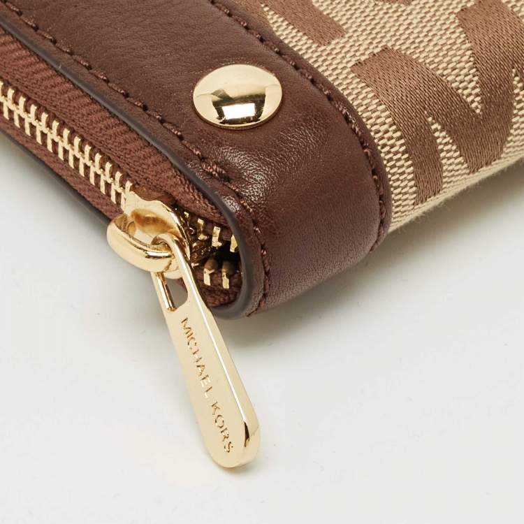 Pre Owned Michael Kors Beige/Dark Brown Signature Canvas and Leather Zip Around Wallet