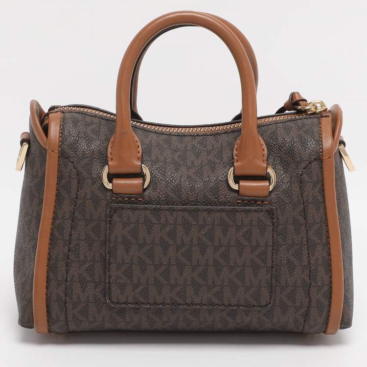 Pre Owned Michael Kors Brown Coated Canvas and Leather Extra Small Carine Satchel