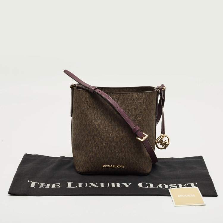 Pre Owned Michael Kors Purple/Brown Signature Coated Canvas and Leather Bucket Bag
