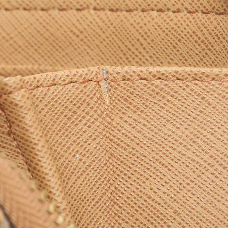 Pre Owned Michael Kors Jet Set Orange Snakeskin Embossed Leather Zip Around Wallets