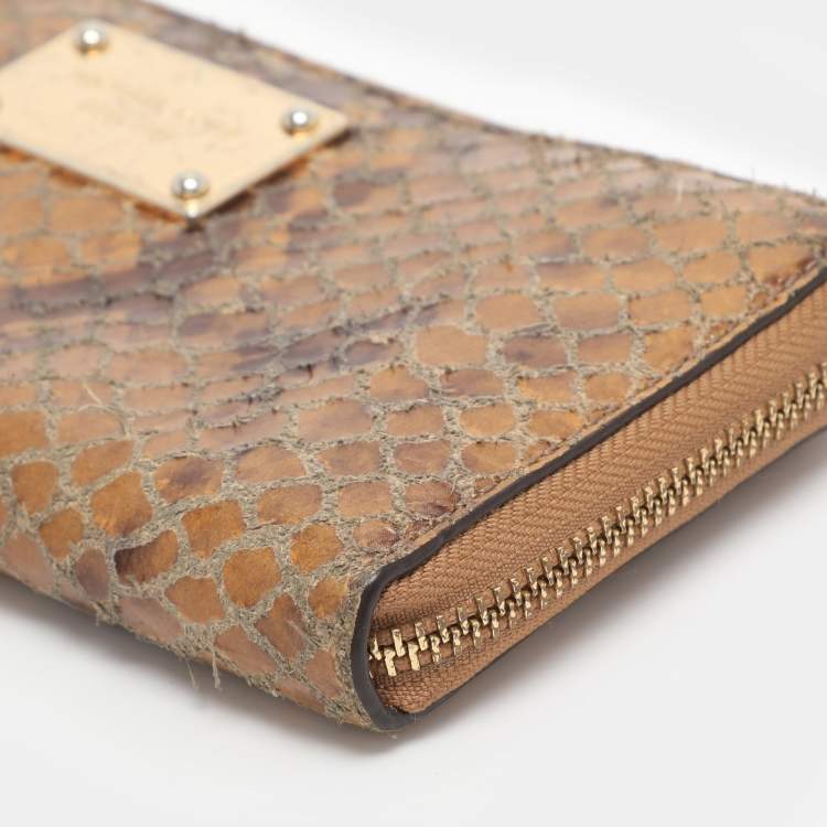Pre Owned Michael Kors Jet Set Orange Snakeskin Embossed Leather Zip Around Wallets