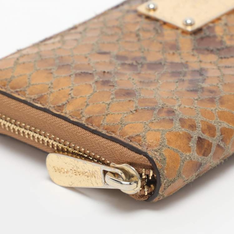 Pre Owned Michael Kors Jet Set Orange Snakeskin Embossed Leather Zip Around Wallets