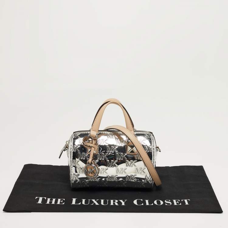 Pre Owned Michael Kors Grayson Silver Signature Embossed Mirror Patent Leather Duffle Crossbody Bag