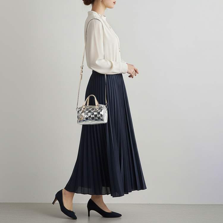 Pre Owned Michael Kors Grayson Silver Signature Embossed Mirror Patent Leather Duffle Crossbody Bag