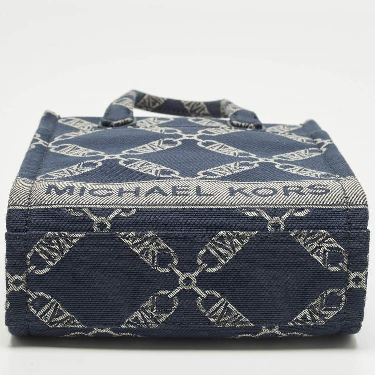Pre Owned Michael Kors Gigi Extra-Small Navy Blue Empire Logo Jacquard Canvas Crossbody Bag