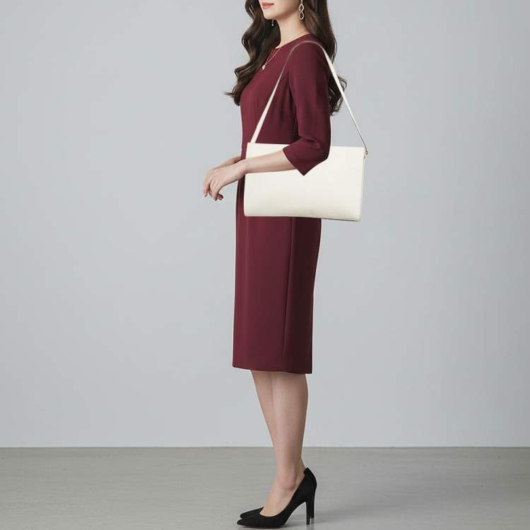 Pre Owned حقيبة كلتش مايكل كورس جلد أبيض مزينة بقصّات تيلدا