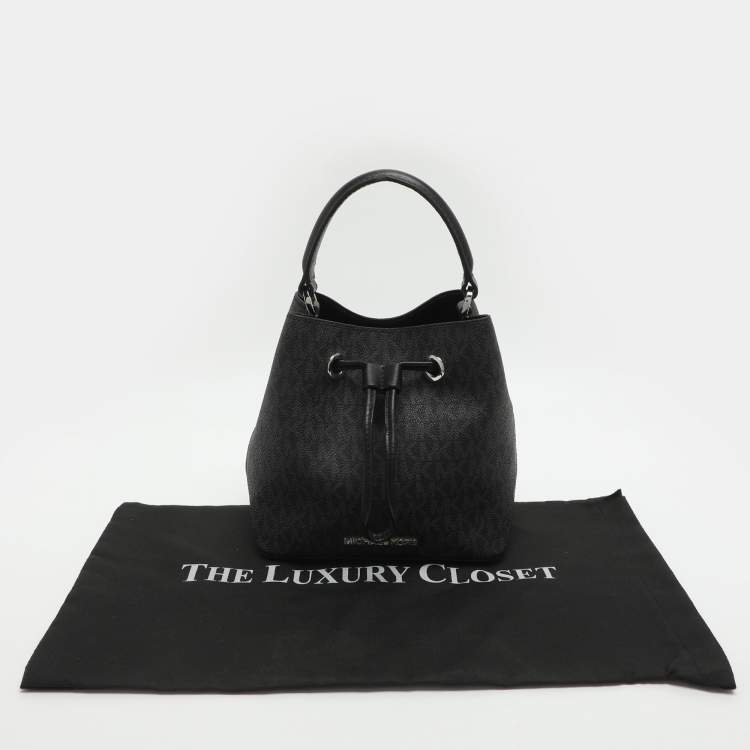 Pre Owned Michael Kors Suri Black Signature Coated Canvas and Leather Drawstring Bucket bag