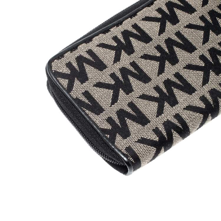 Pre Owned Michael Kors Black Signature Canvas Zip Around Wallet
