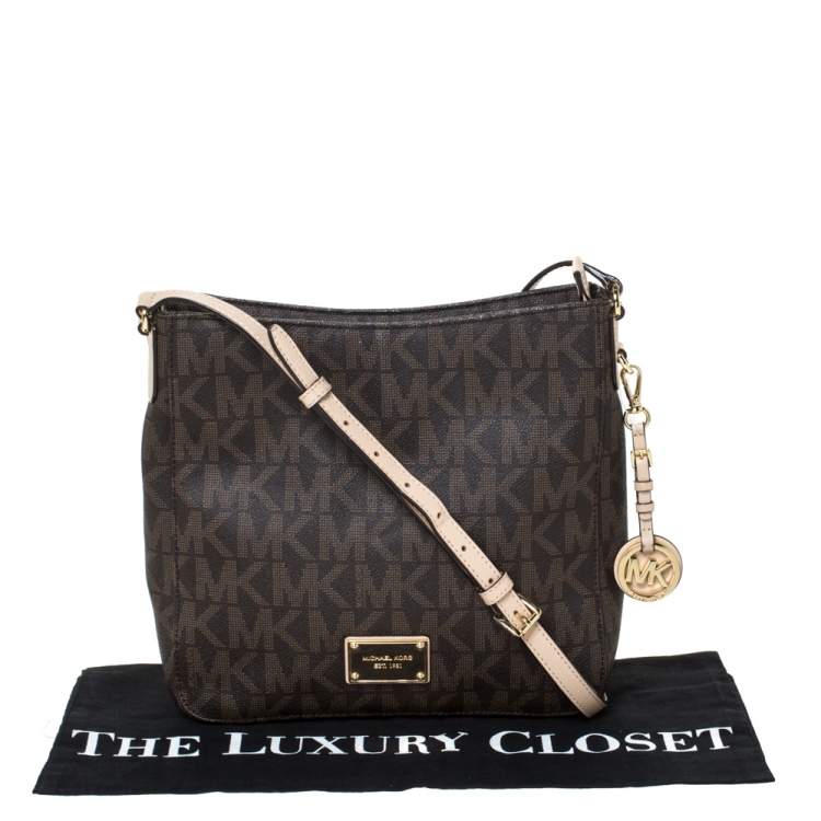 Pre Owned Michael Michael Kors Brown Coated Canvas and Leather Jet Set Travel Messenger Bag
