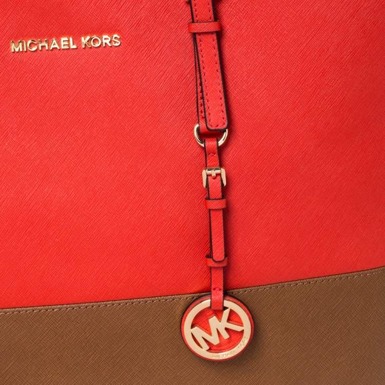Pre Owned MICHAEL Michael Kors Orange/Brown Leather Jet Set Travel Tote