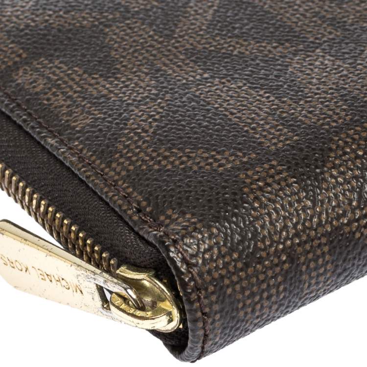 Pre Owned Michael Kors Brown Signature Coated Canvas  Zip Around Wallet