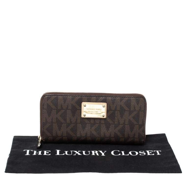 Pre Owned Michael Kors Brown Signature Coated Canvas Zip Around Wallet