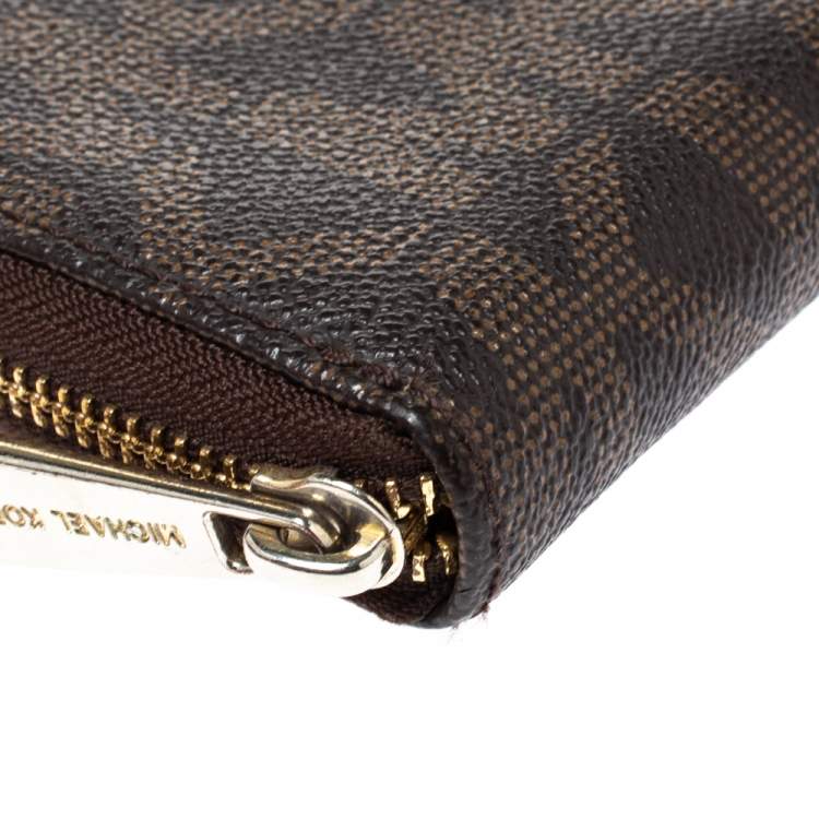 Pre Owned Michael Kors Brown Signature Coated Canvas Zip Around Wallet