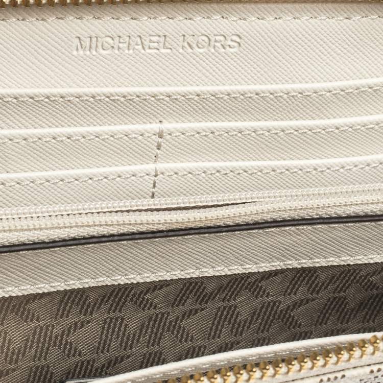 Pre Owned Michael Kors White Monogram Coated Canvas Zip Around Wallet