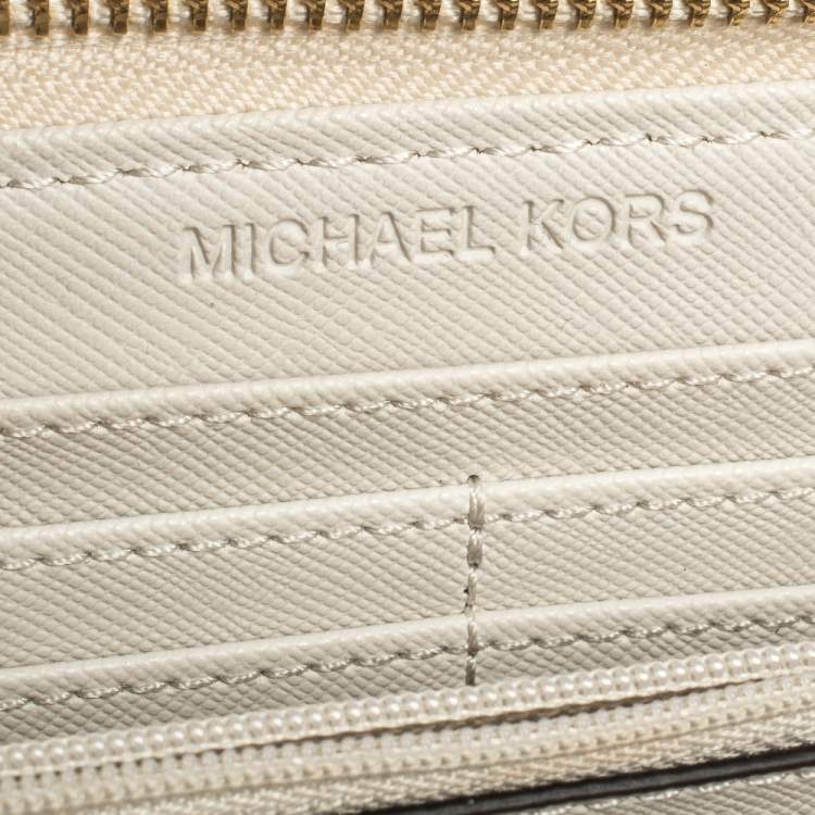 Pre Owned Michael Kors White Monogram Coated Canvas Zip Around Wallet