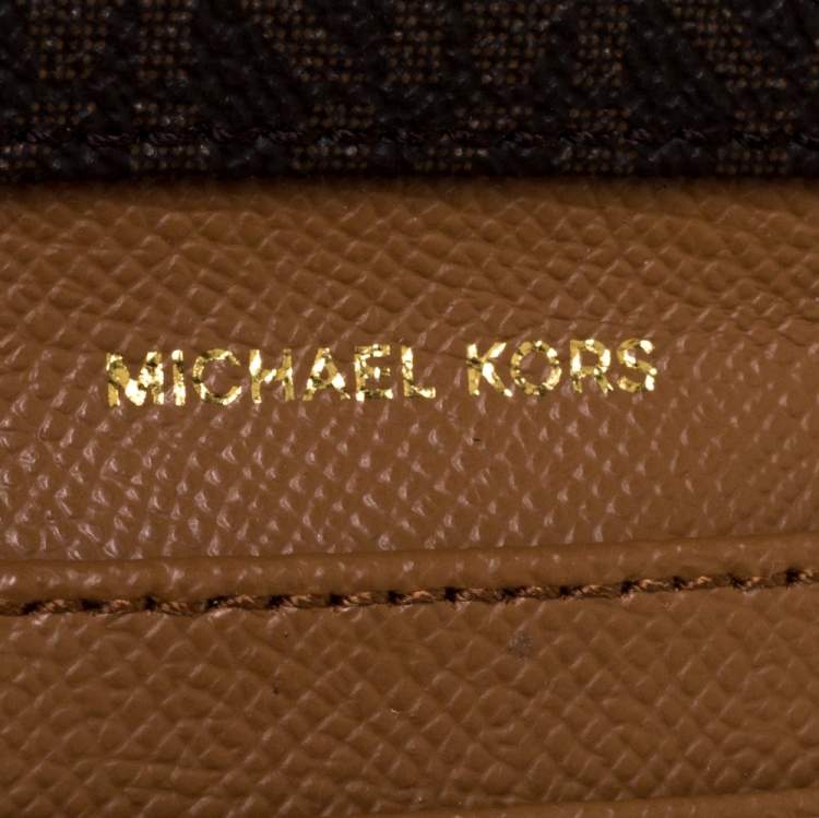 Pre Owned Michael Kors Brown Signature Coated Canvas Zip Around Wallet