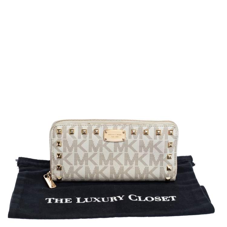 Pre Owned Michael Kors White Signature Coated Canvas Studded Zip Around Continental Wallet