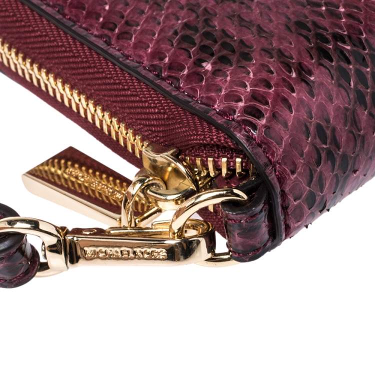 Pre Owned Michael Kors Burgundy Python Zip Around Wristlet Wallet