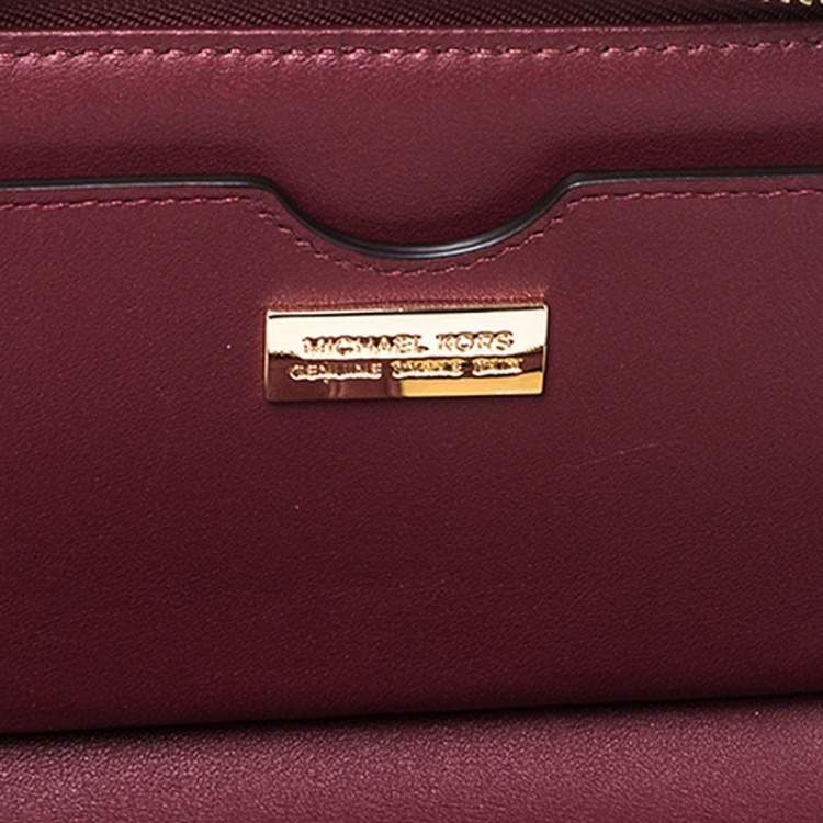 Pre Owned Michael Kors Burgundy Python Zip Around Wristlet Wallet